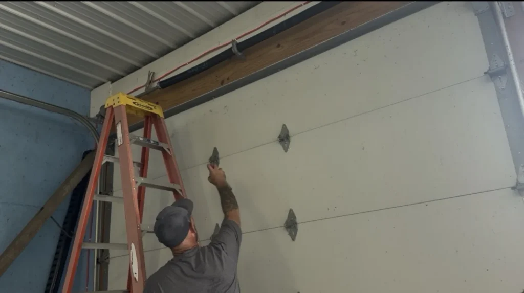 Garage door maintenance after high-cycle torsion spring replacement in Roachdale Indiana